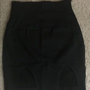 Pencil skirt with cutout detailing at the bottom!